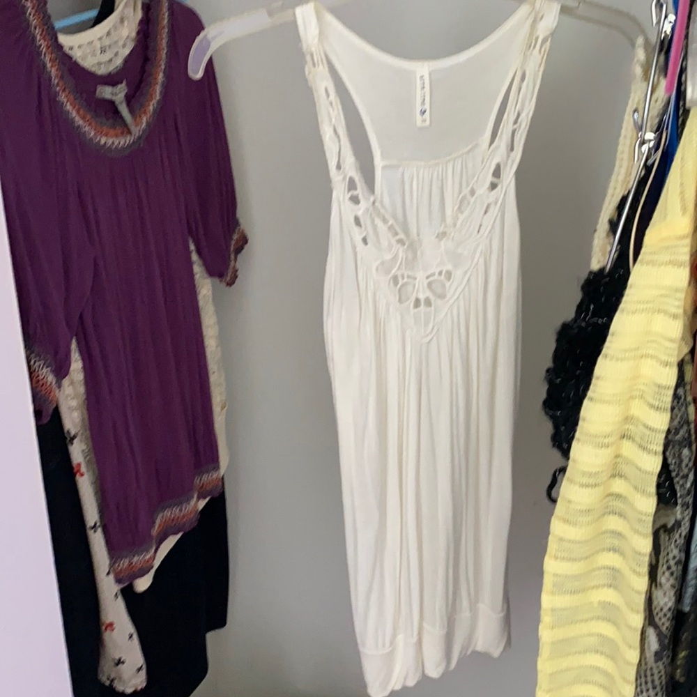 White tank top with cut out floral design on chest